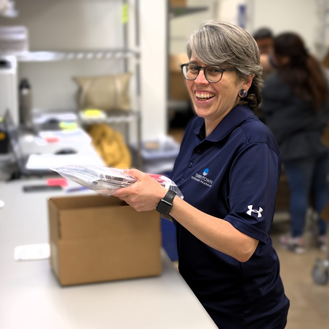 Tarrytown Pharmacy Worker Shipping Medication