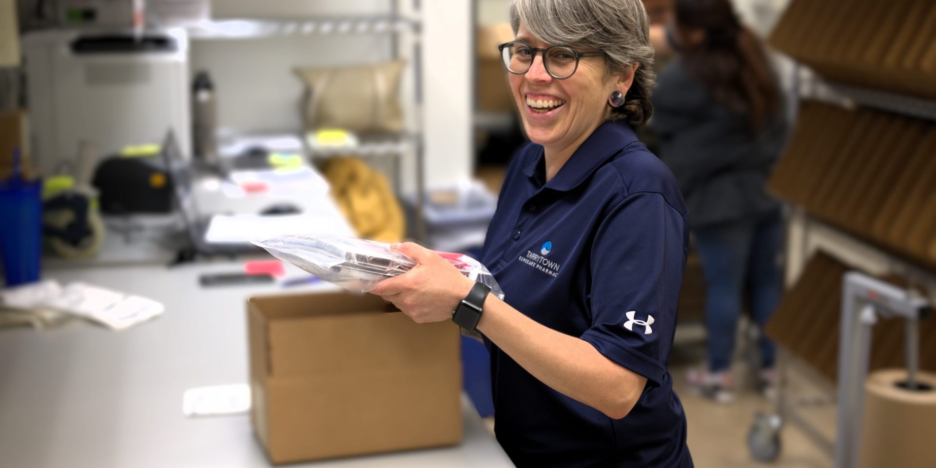 Tarrytown Pharmacy Worker Shipping Medication